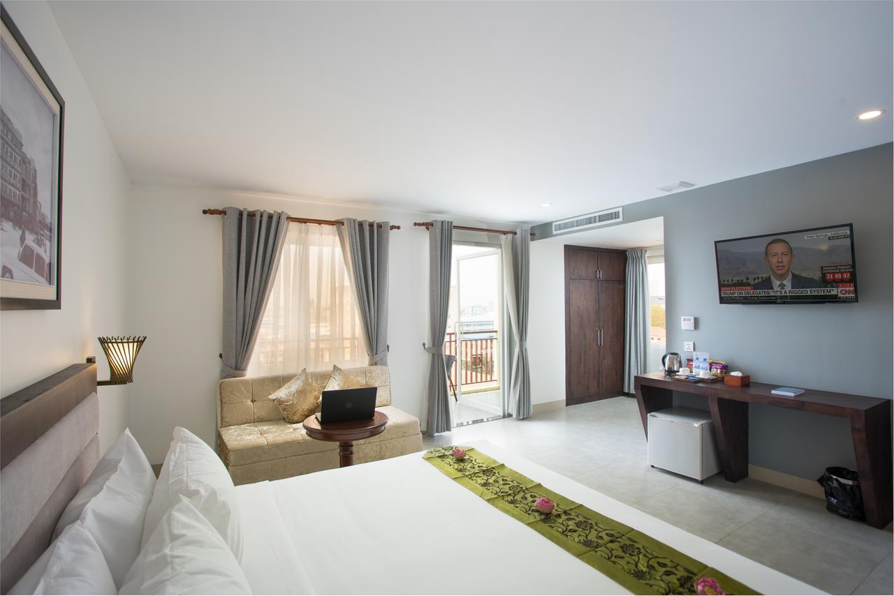 Kuch Oudom Hotel Phnom-Penh Buitenkant foto